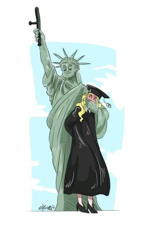 كاريكاتير.. تمثال الحرية...