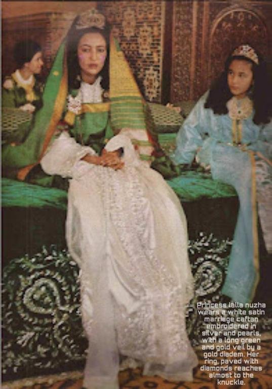 Princess Lalla Nuzha of Morocco at her wedding day with the Takhlila Makhzania, 29 October 1964.The Kingdom of Morocco spentseven days and seven nightscelebrating the joyful occasionof The royal wedding👸🏻🇲🇦#التخليله_المخزنيه #الخليلة_الرباطية. #moroccan_tradition #moroccoculture #moroccanstyle #moroccanwedding. #التراث_المغربي #الثرات_المغربي #القفطان_المغربي #القفطان_الملكي #القفطان_المغربي_الاصل_والباقي_سرقه #القفطان_المغربي_العالمي